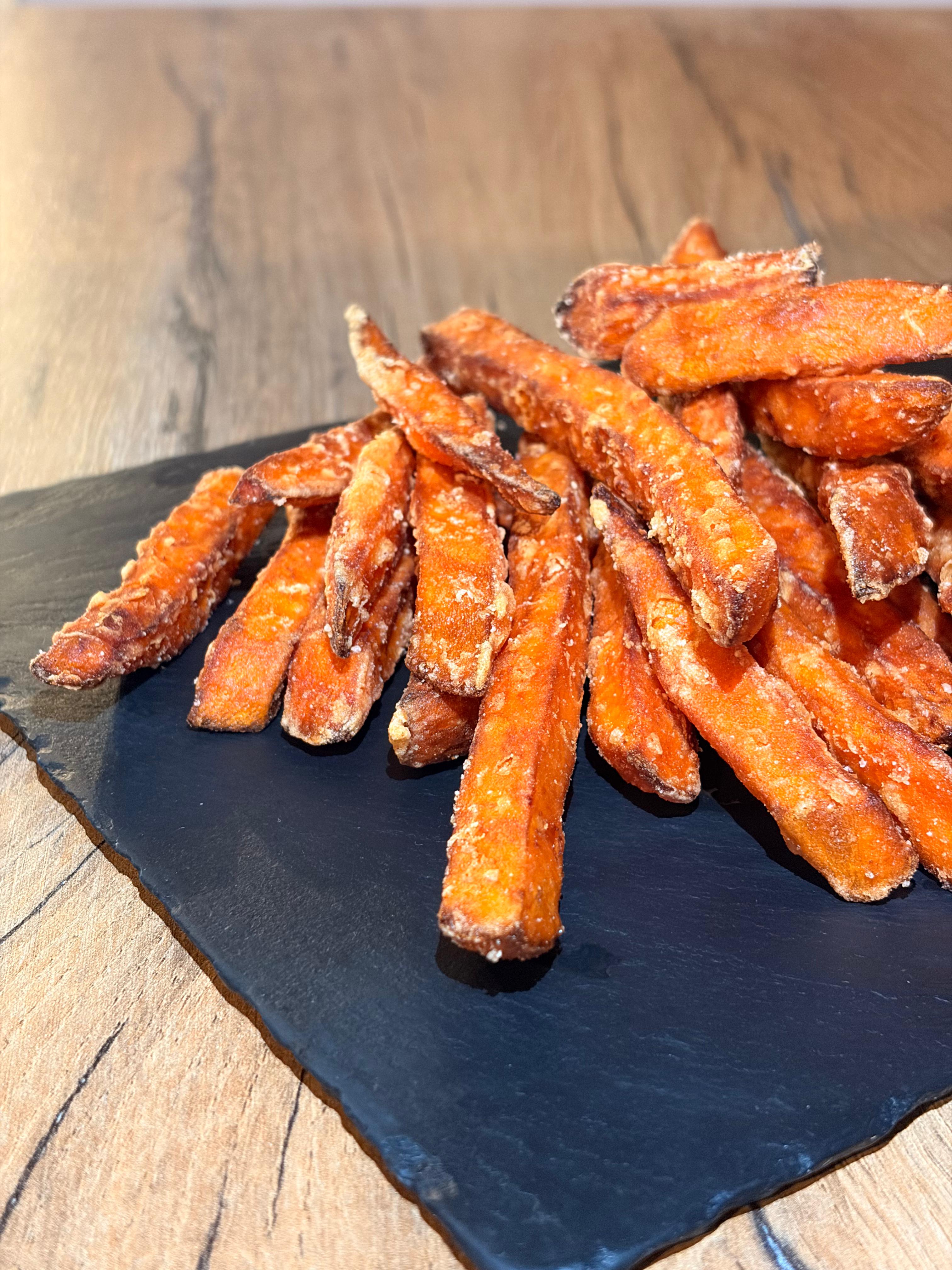 Sweet fries with parmesan and sauce